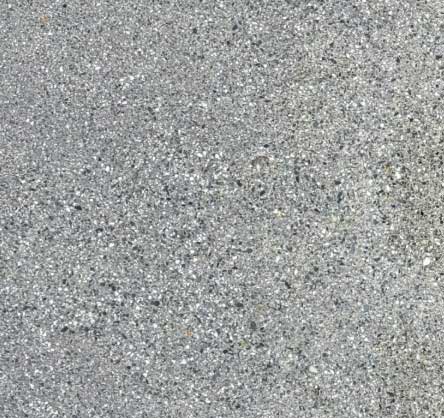 The same Lynchburg, VA concrete restored to clean grey after pressure washing